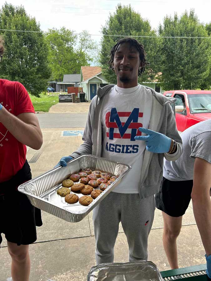 volunteer serving meals